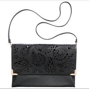 H&M Hole-pattern black clutch bag